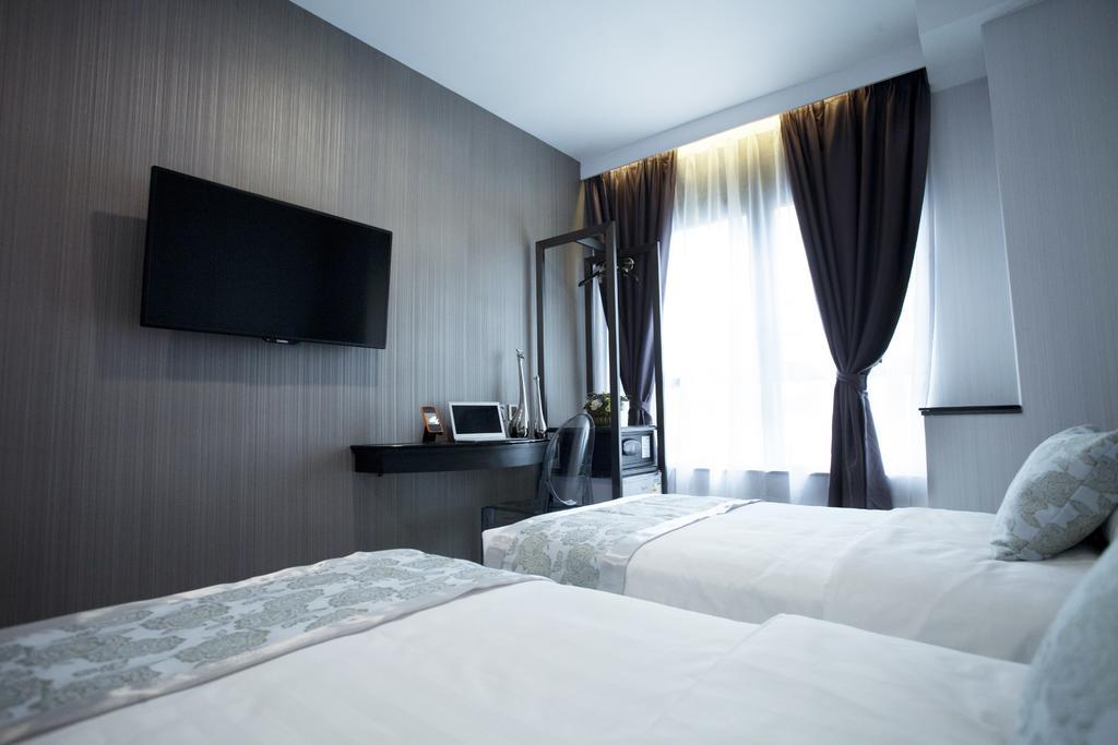M1 North Point Hotel Hongkong Rum bild
